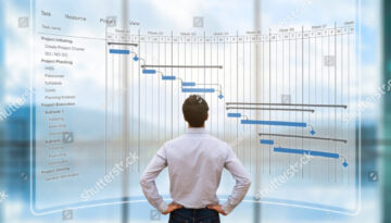 stock-photo-project-manager-looking-at-ar-screen-with-gantt-chart-schedule-or-planning-showing-tasks-and-713811001